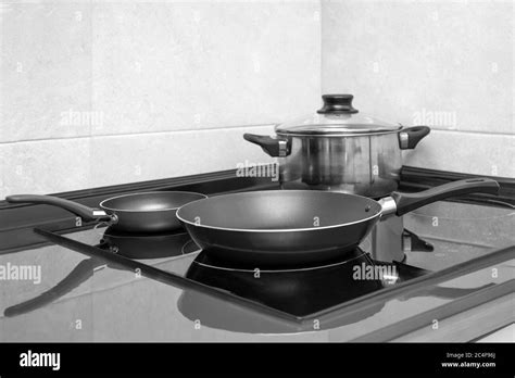 Thematic photo of a modern kitchen with an electric pan in use