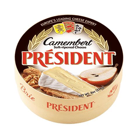 Président Camembert sir na leseni deski, prerezan, s francosko bageto
