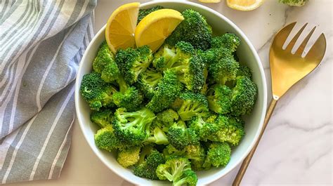 Thematic photo of fresh broccoli and steamed broccoli