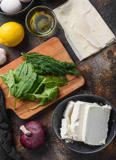 Photo of all ingredients laid out for spanakopita preparation.