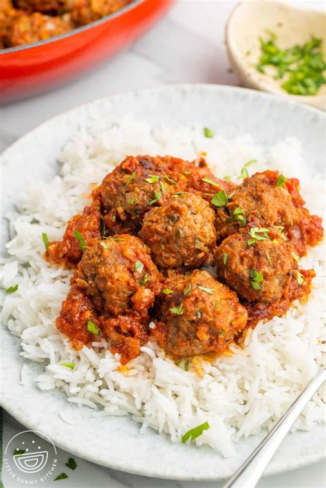Photo of meatballs (čufti) in tomato sauce with rice as a side