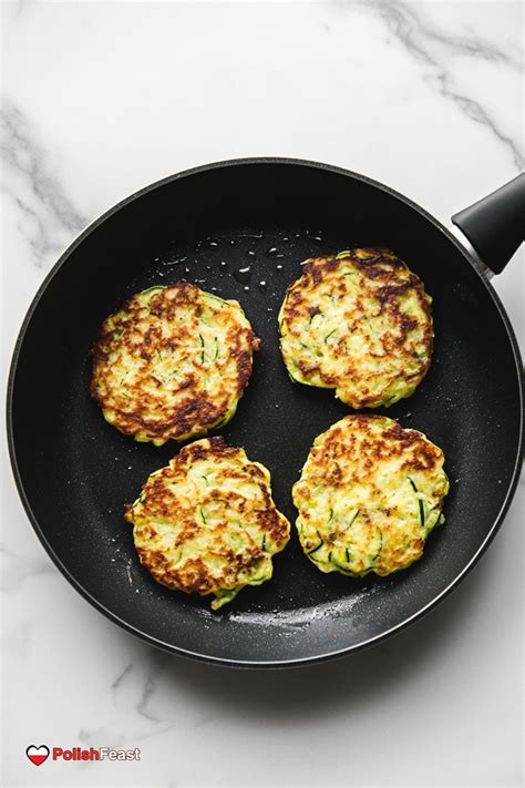 Thematic photo of cooking zucchini pancakes on a pan