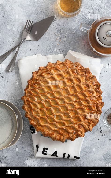 Photo of a traditional homemade potato pie, freshly baked and golden brown