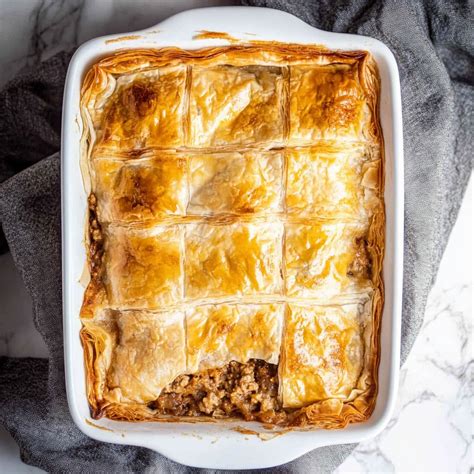 Infographic showing the layers of a meat and potato pie with phyllo dough
