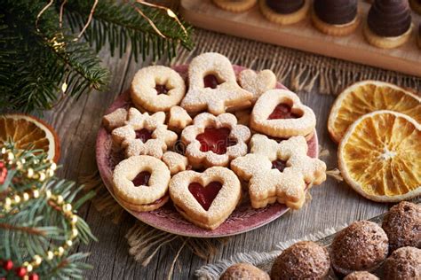 Thematic photo of various homemade cookies with marmalade and nuts