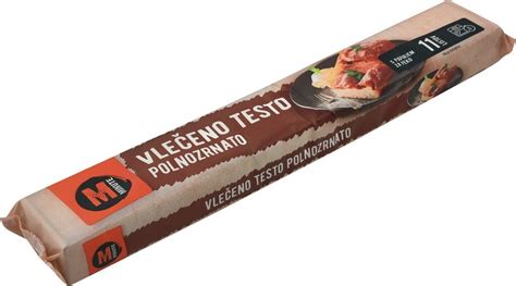 Slika kmečkih rok, ki pripravljajo vlečeno testo
