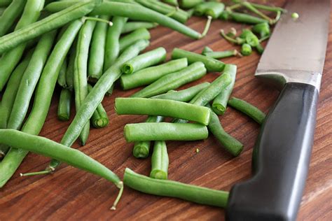 Fresh green beans cut into pieces, ready for cooking