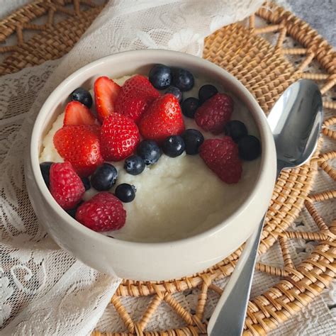 Various toppings for semolina porridge, such as berries, nuts, and chocolate