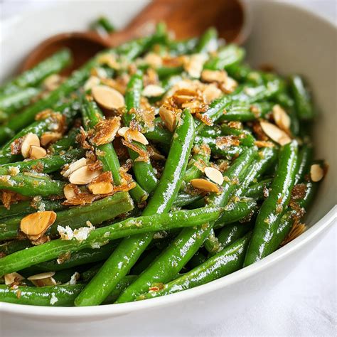 Thematic photo of green beans with almonds and garlic