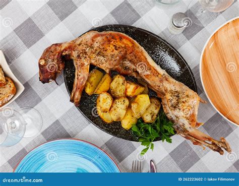 Thematic photo of a baked rabbit dish
