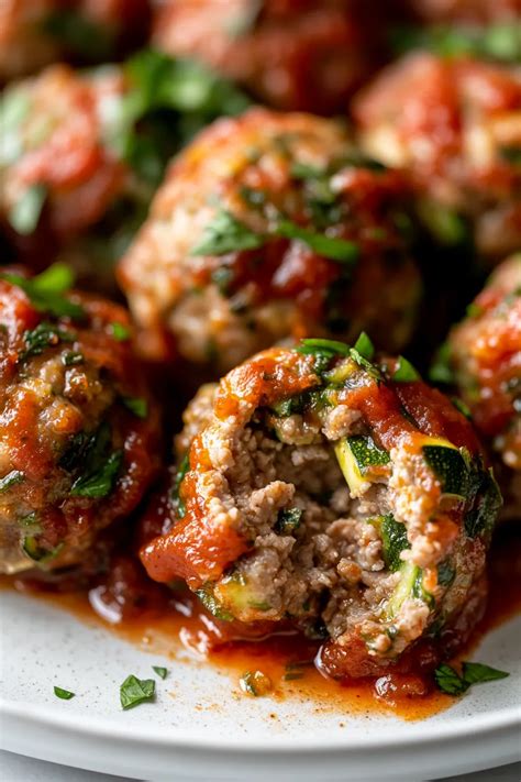 Photo of baked meatballs with herbs
