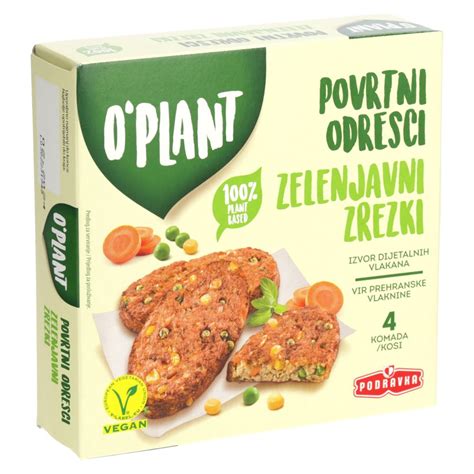 Fotografija: pečeni zlato rjavi zelenjavni zrezki na servirnem krožniku