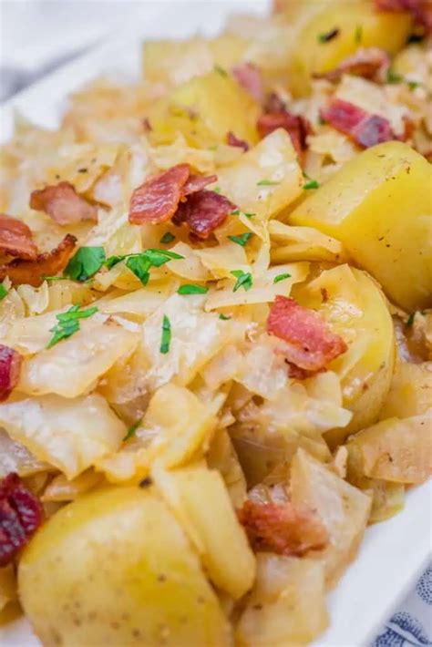 Serving suggestion: sweet cabbage with boiled potatoes and fresh parsley in a rustic setting