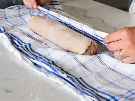 Photo of štruklji wrapped in a cloth before cooking