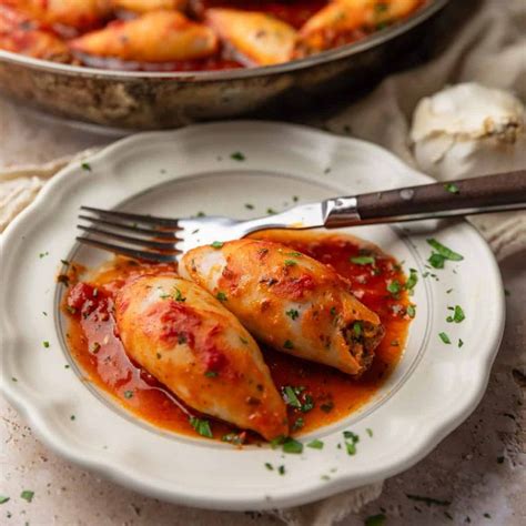 Thematic photo of stuffed squid in a rich wine sauce