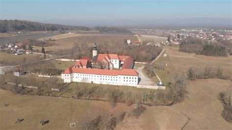 Zgodovinska fotografija picerije Otok v Kostanjevici na Krki ali zemljevid lokacije