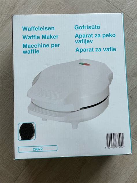 fotografija aparata za peko vafljev Silvercrest na kuhinjskem pultu