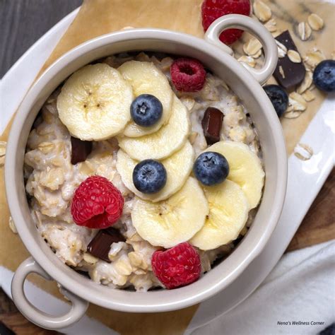 Thematic photo of oatmeal cookies with milk and fruit for breakfast