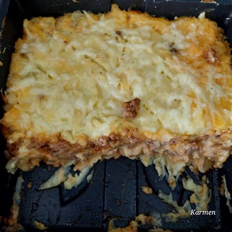 pečenka buča v pečici, narezana na kose, s čebulo in česnom