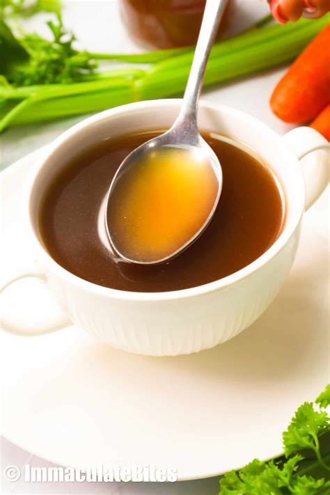 Thematic photo of a bowl of beef broth, steaming