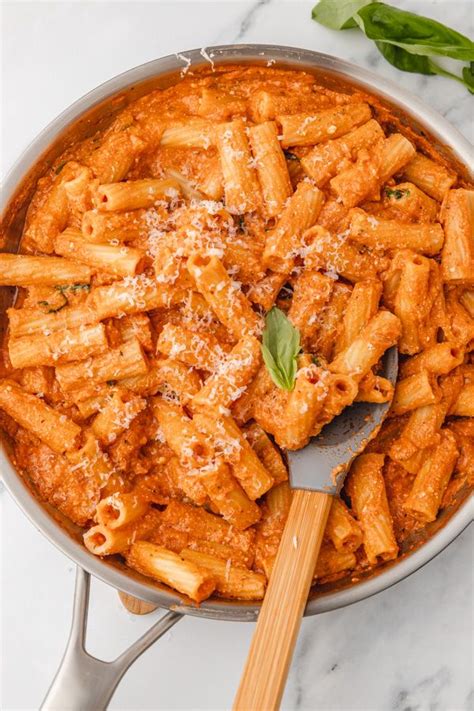 Thematic photo of pasta with tomato sauce and ricotta