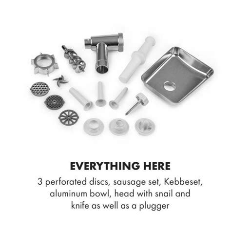 Različni deli ročnega mlinčka za meso, jasno označeni