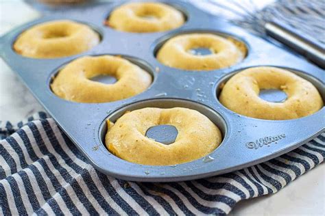 Photo of baked donuts in a donut pan