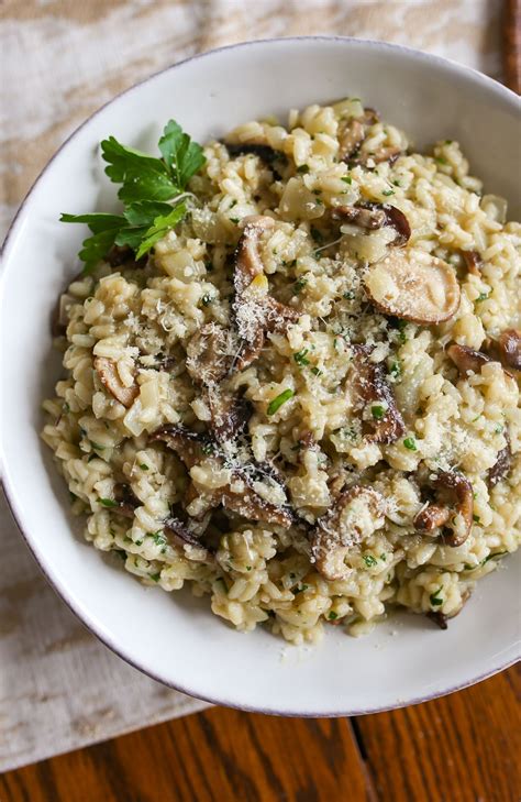 Thematic photo of creamy risotto with porcini mushrooms and parsley