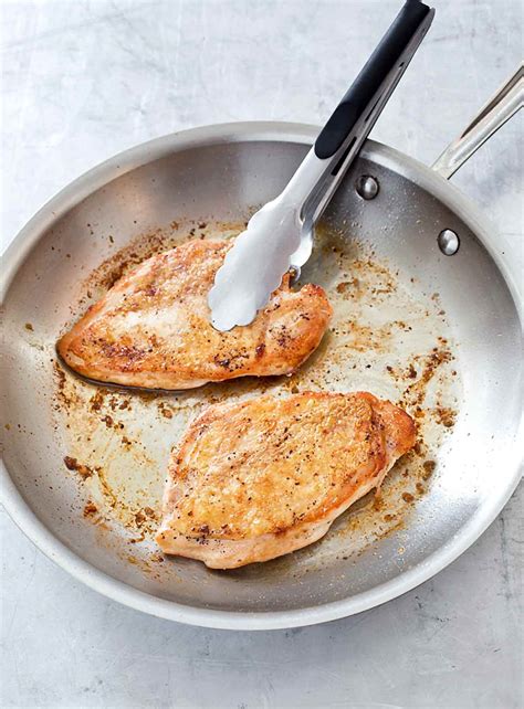 Step-by-step photo of chicken breast being seared in a pan.