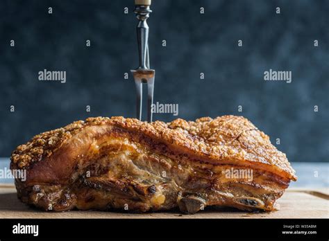 Thematic photo of a large piece of roasted pork with bone