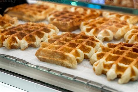Thematic photo of freshly baked waffles with various toppings