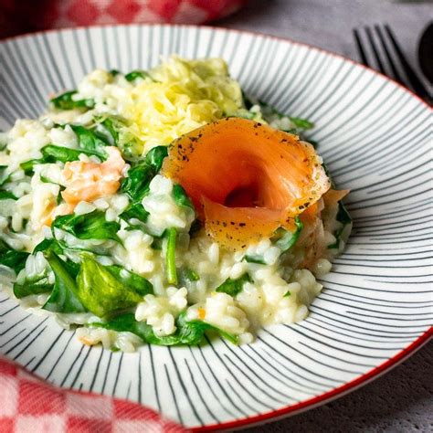 Thematic photo of a creamy risotto with green beans and smoked salmon in a bowl