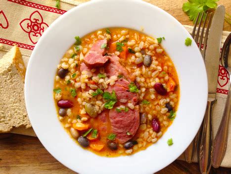 Thematic photo of a bowl of traditional Slovenian ričet (barley stew)