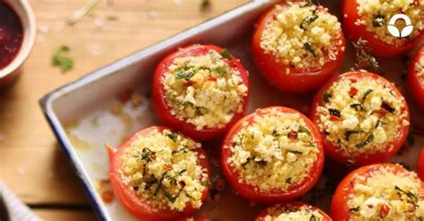 Thematic photo of filled tomatoes with couscous on a plate
