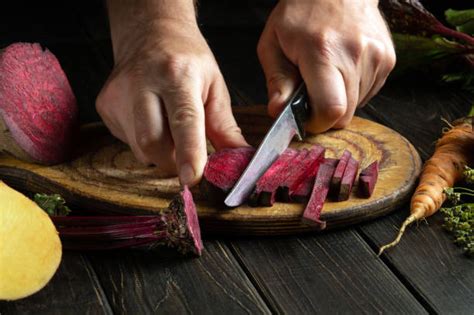 Thematic photo of hands preparing beetroot