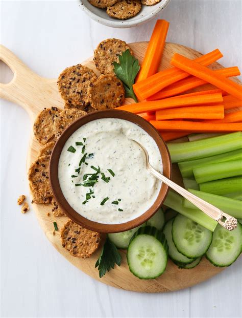 Thematic photo of various vegetables served with cottage cheese dip