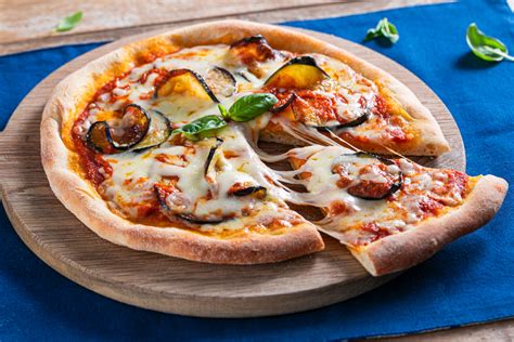 Photo of a completed Pizza Parmigiana with eggplant