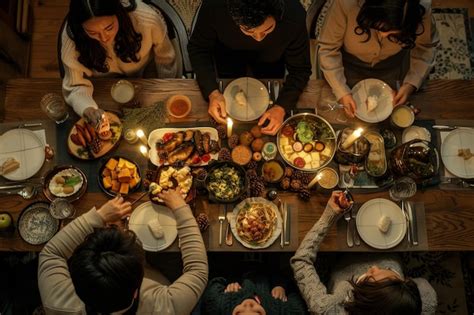 Thematic photo of a family gathered around a table with sarma for a holiday meal.