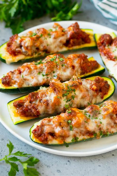 Photo of stuffed zucchini baked in the oven with melted cheese