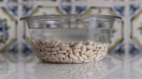 Thematic photo of dry beans soaking in water overnight