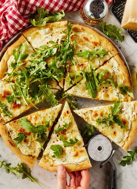 Thematic photo of white pizza with various toppings
