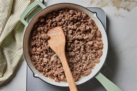 Thematic photo of ground beef browning in a pan