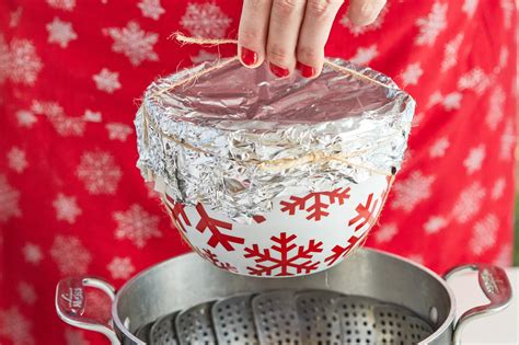 Steaming setup for Christmas Pudding in a pot on the stove