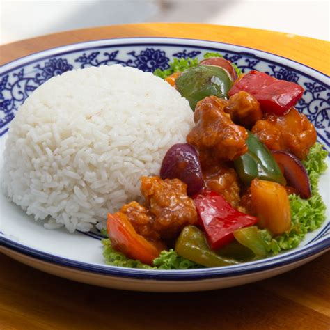 Thematic photo of sweet and sour pork with rice