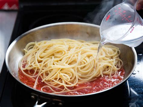 Photo of pasta water being added to a sauce