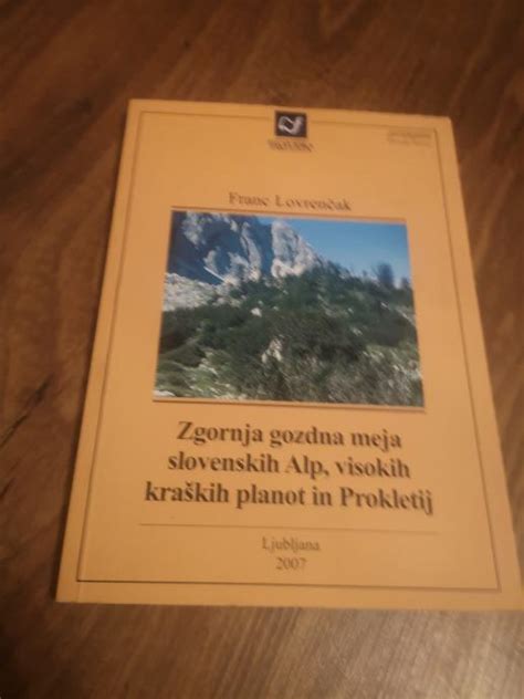 Slika ali ilustracija, ki prikazuje poreklo mesnin iz Bohinja, morda z motivom slovenskih Alp.