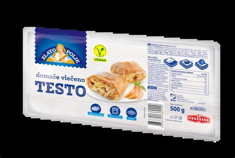 Fotografija prereza prekmurske gibanice, kjer se jasno vidijo štiri plasti nadevov in vlečeno testo.