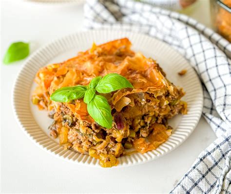 Fotografija pečenega kislega zelja z mesnim nadevom