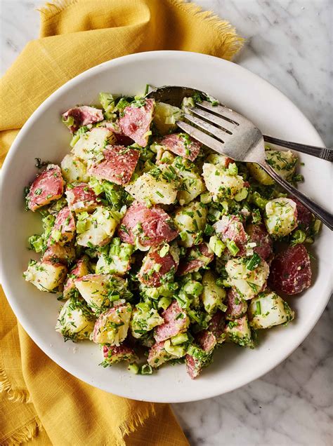 Thematic photo of potato salad with various fresh vegetables