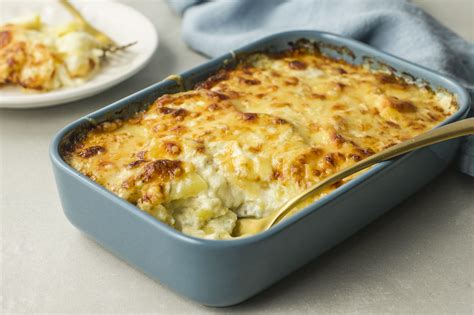 Thematic photo of gratin dauphinoise in a ceramic dish, golden brown top